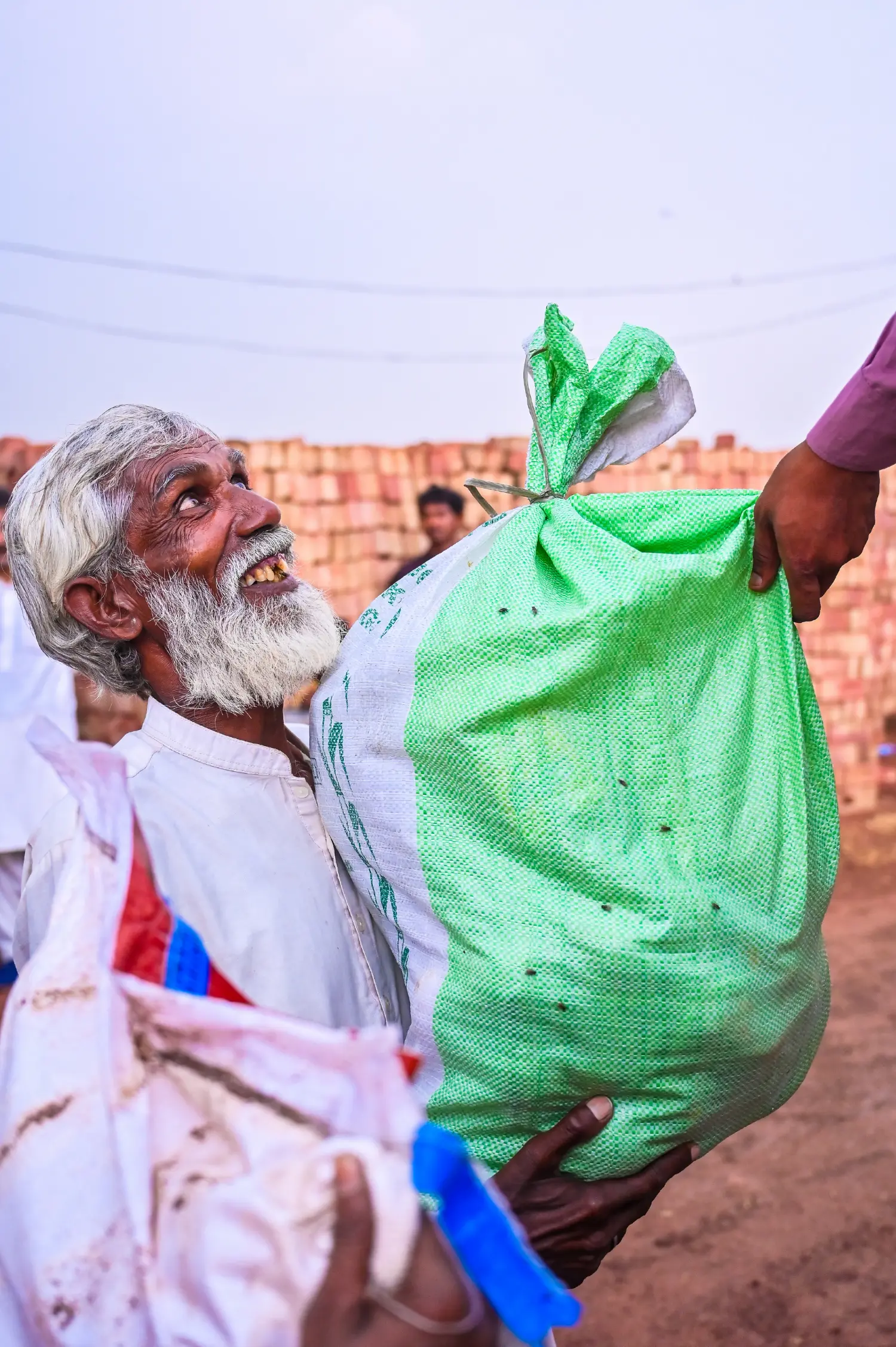 An Elder Receives His Ration