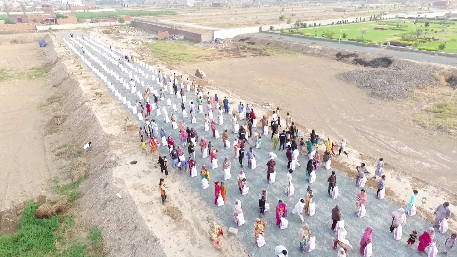Hundreds of families receiving food rations from H.O.P.E. in Pakistan