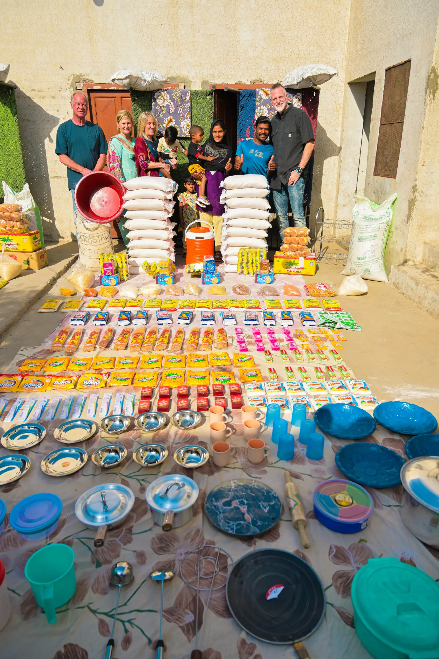 Families with one year of food rations, cots and essentials