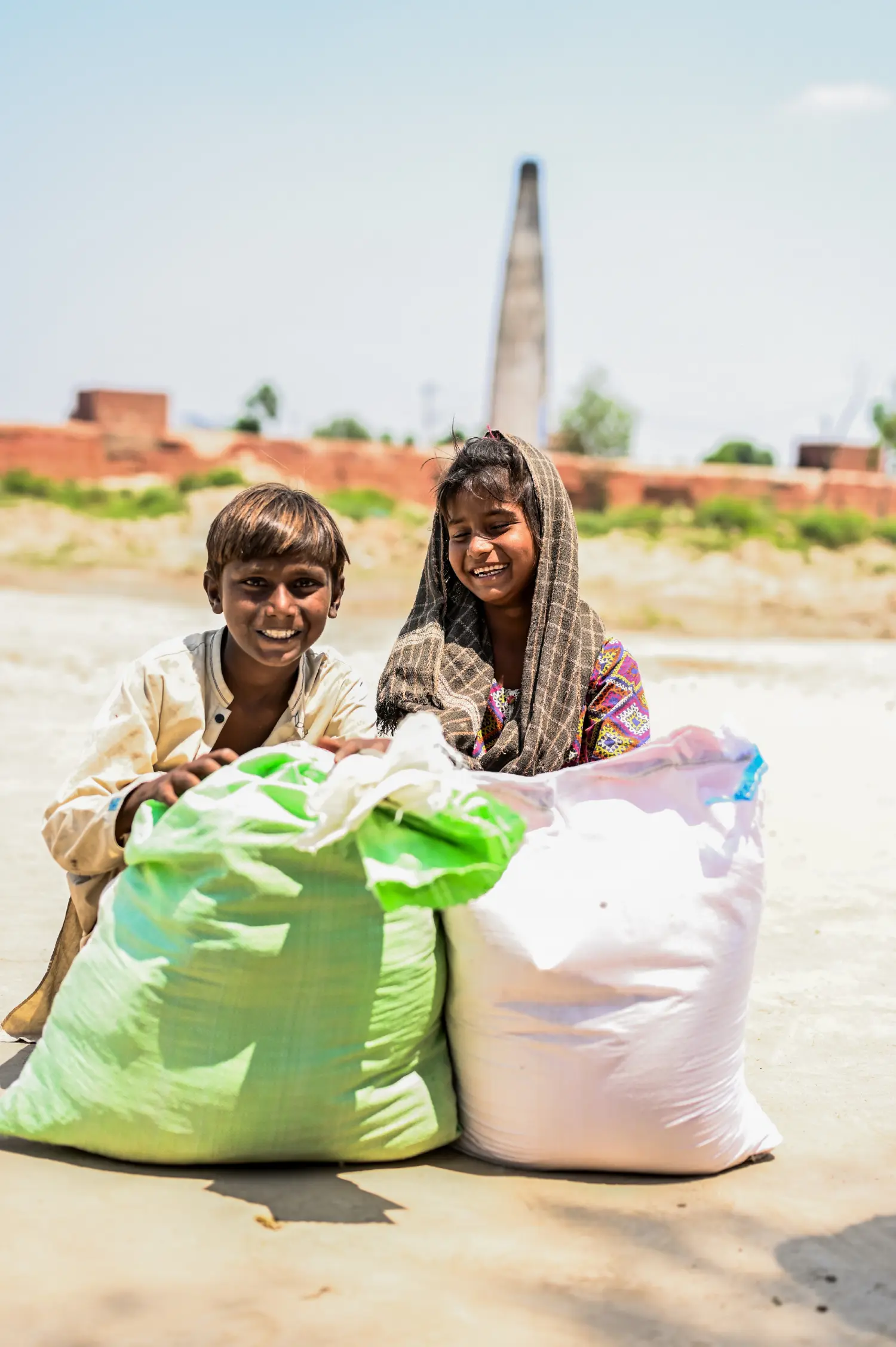 Children Sit With Their Ration