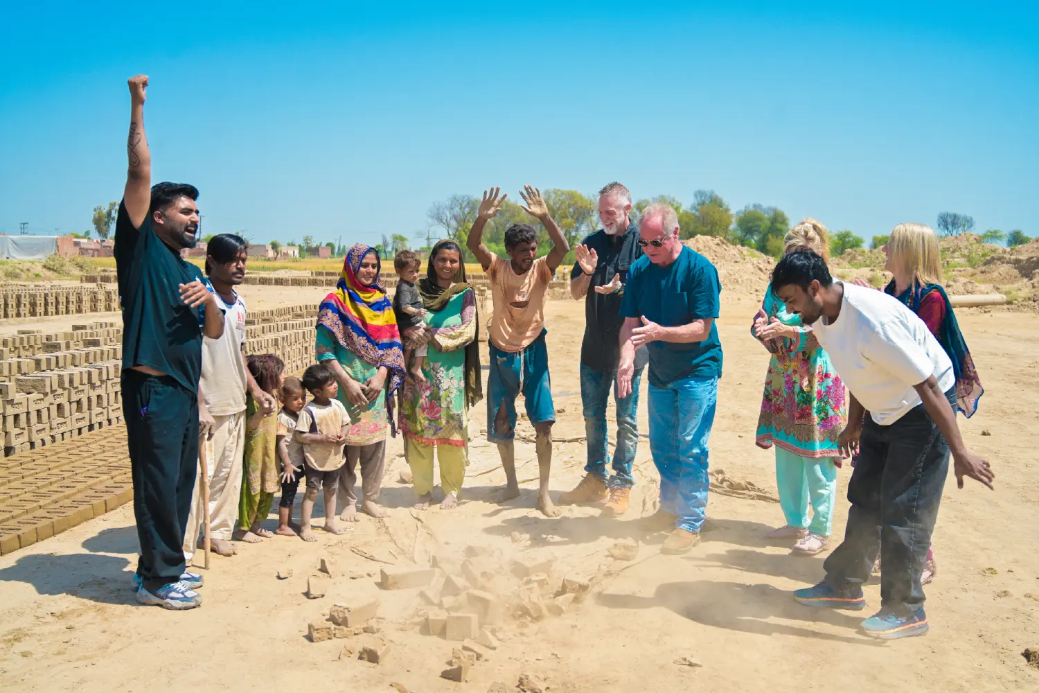 Breaking bricks at the brick kiln during a rescue