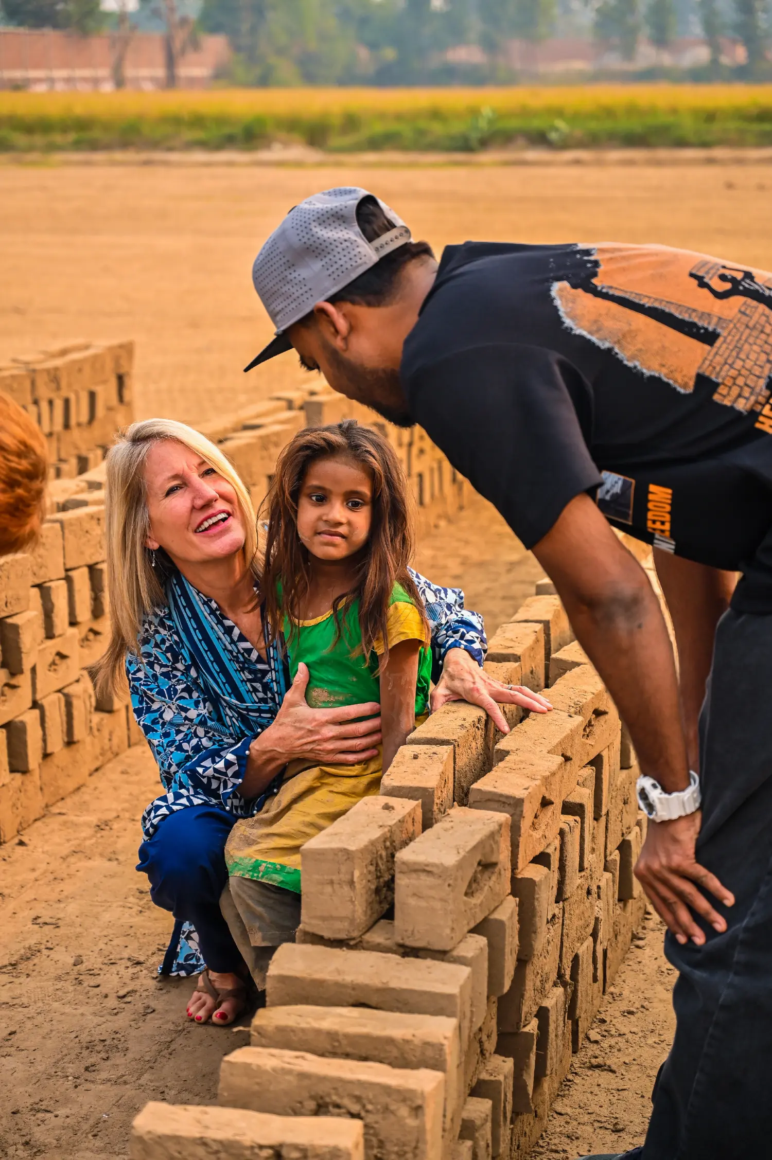H.O.P.E. founders rescuing a young girl from bonded slavery