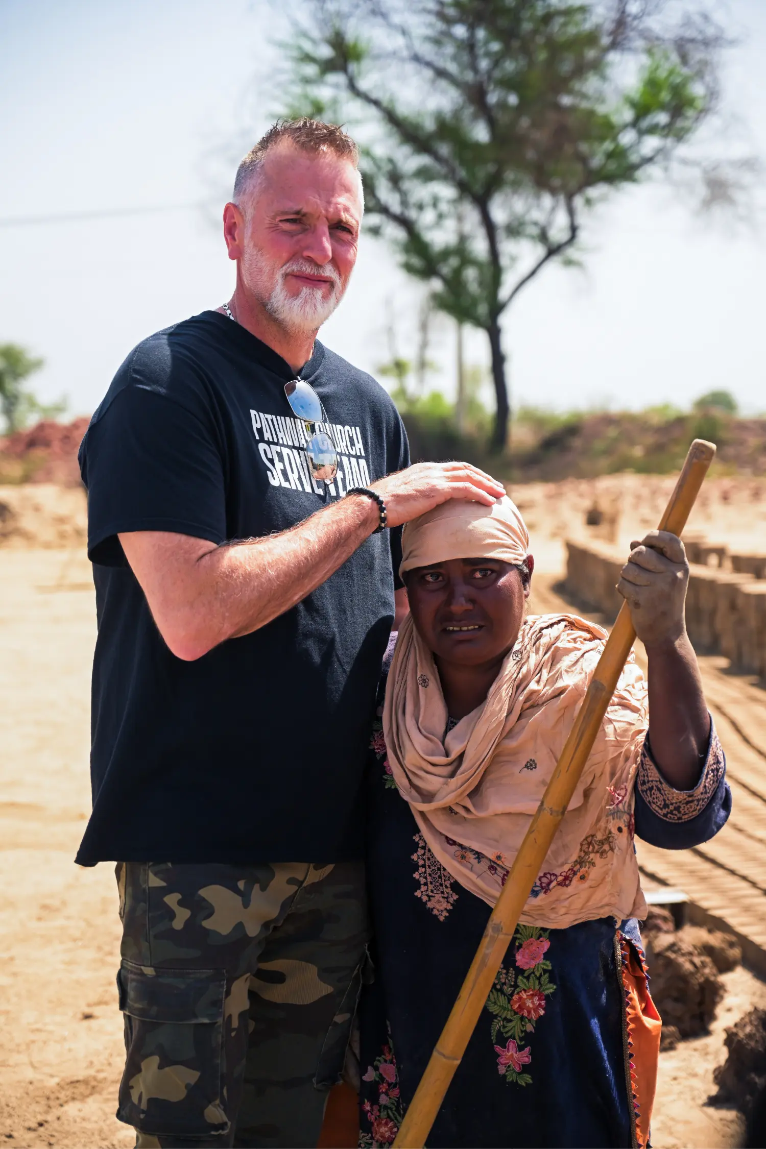 A pastor from the United States rescuing an elderly woman