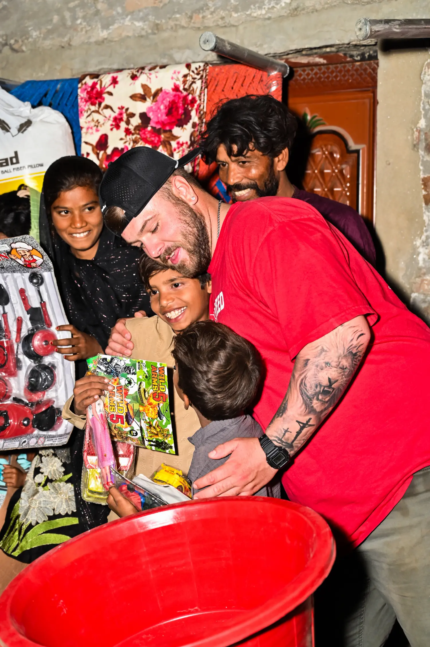 A H.O.P.E. partner hugging children after rescue