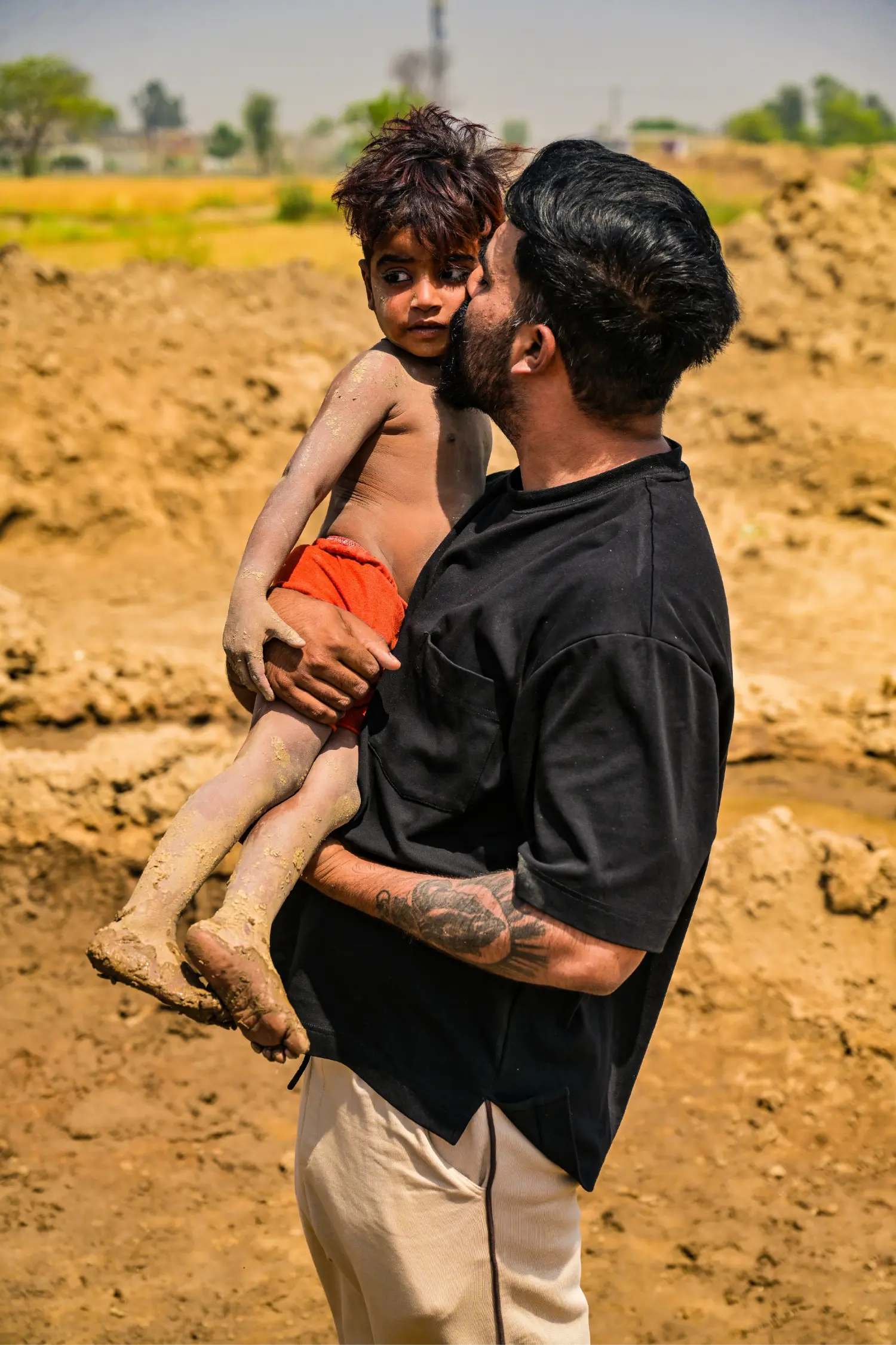 Pastor with a rescued boy