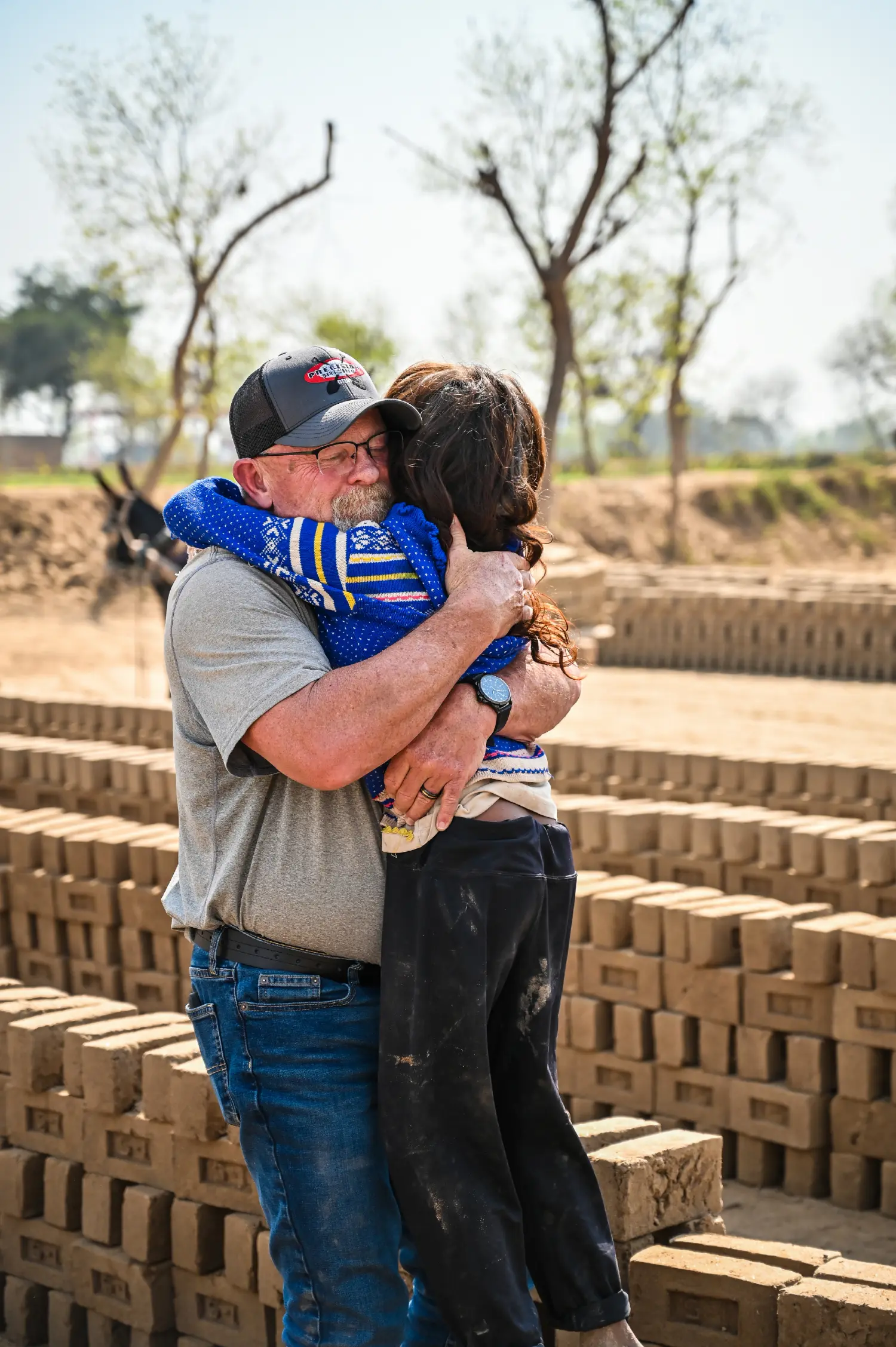 A pastor from the United States holding rescued children