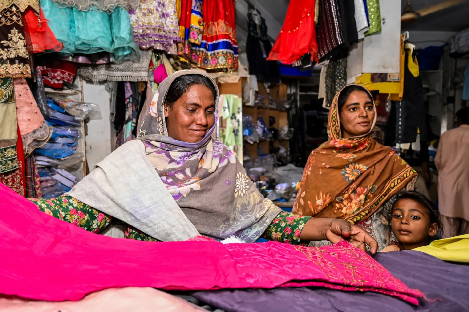 A woman shopping for clothes after being freed