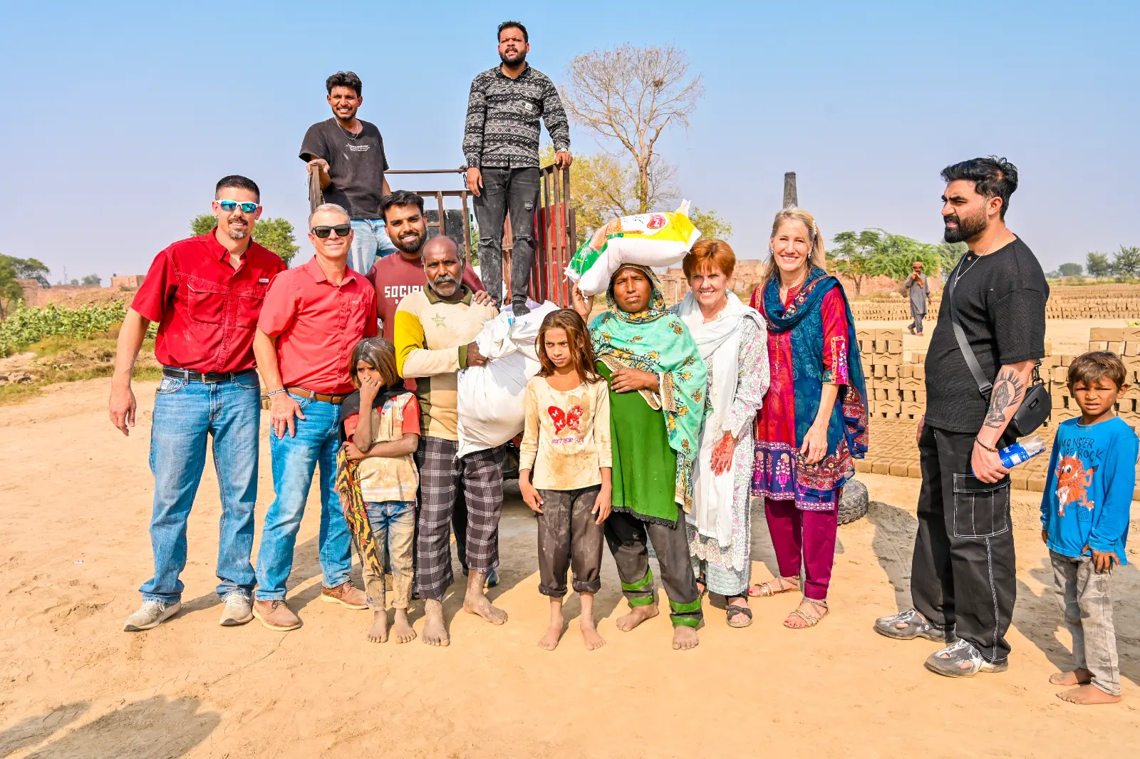 The H.O.P.E. team distributing food rations at a brick factory in Pakistan