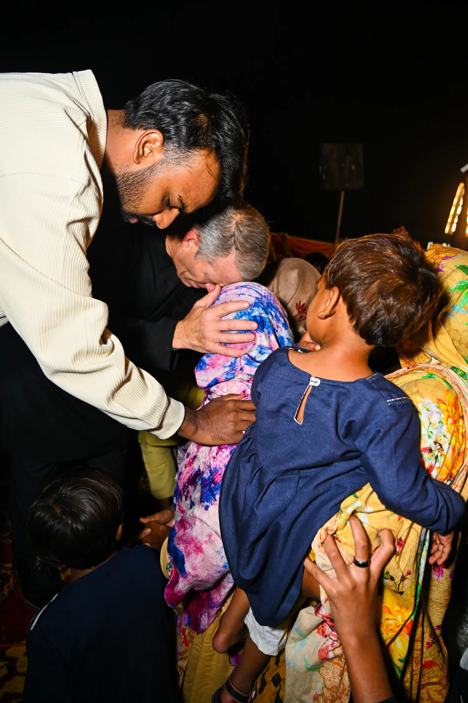Praying over people after a crusade