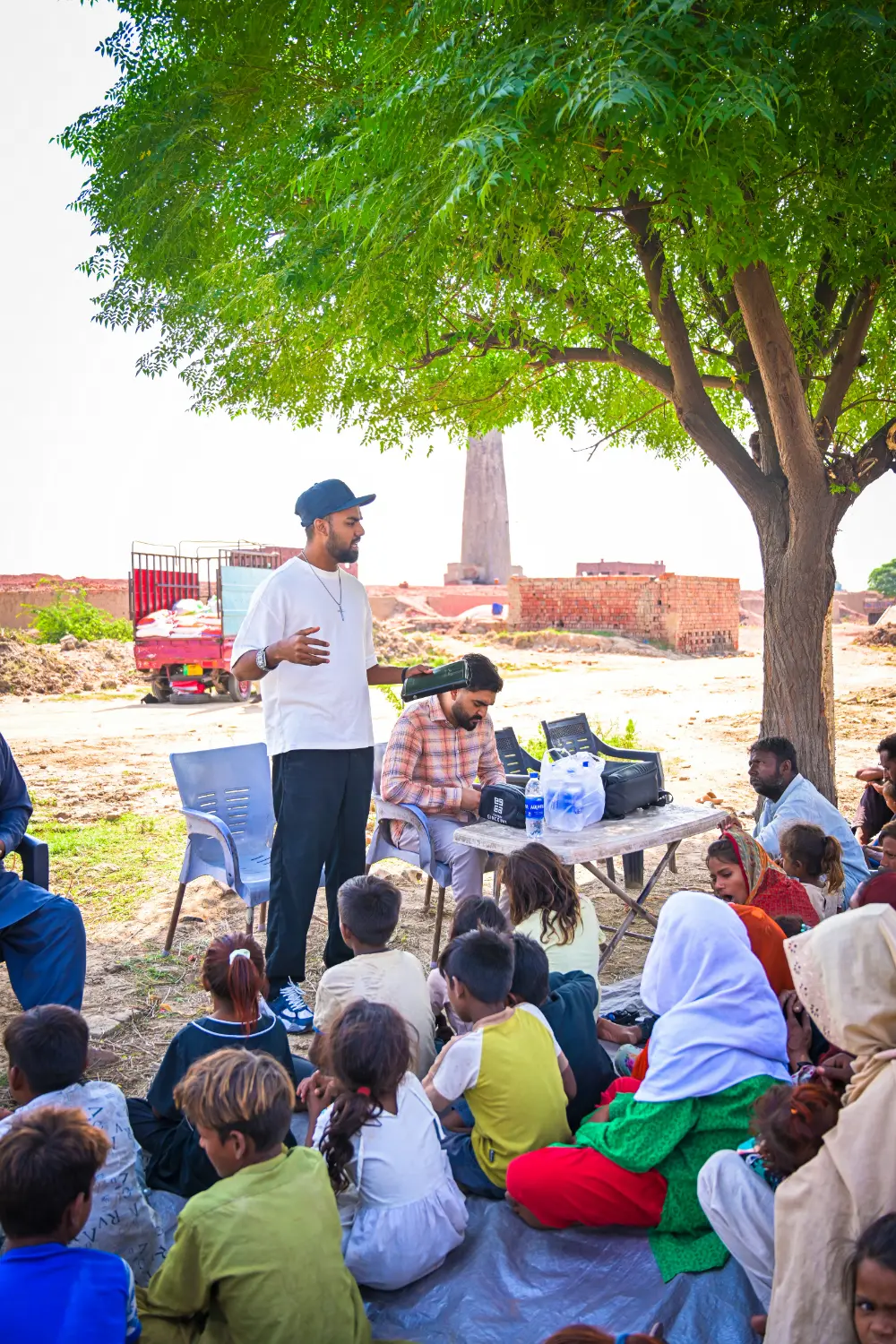 Pastor Suryani Javed preaching among brick kiln workers