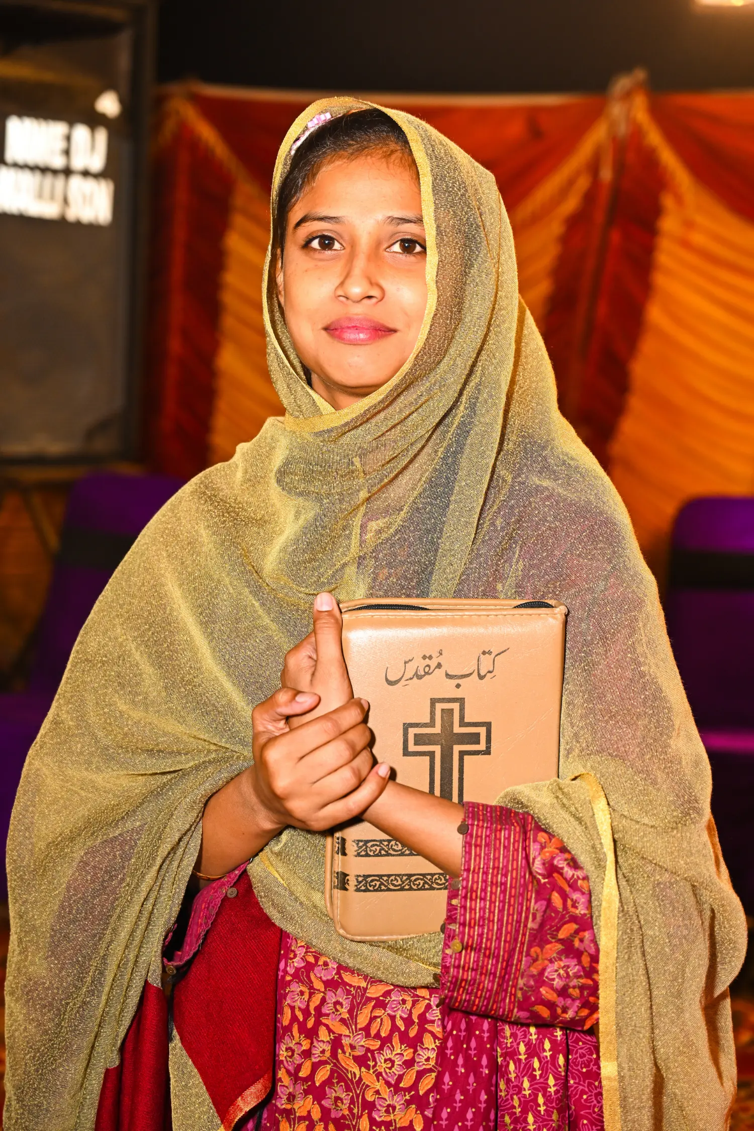 A Girl Holds Her Bible