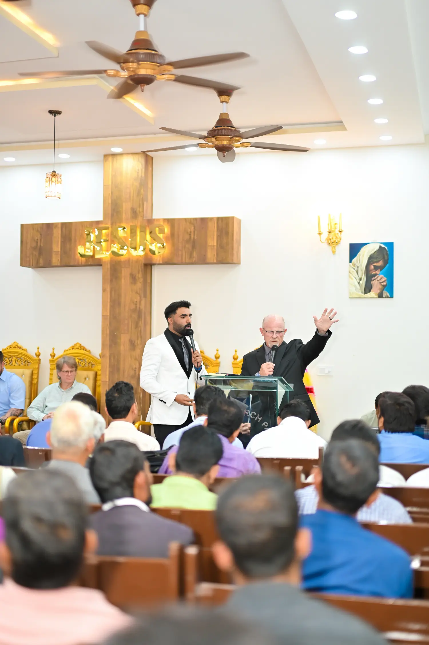 Pastor Ashkar Javed and Pastor Mark preaching at a pastors conference