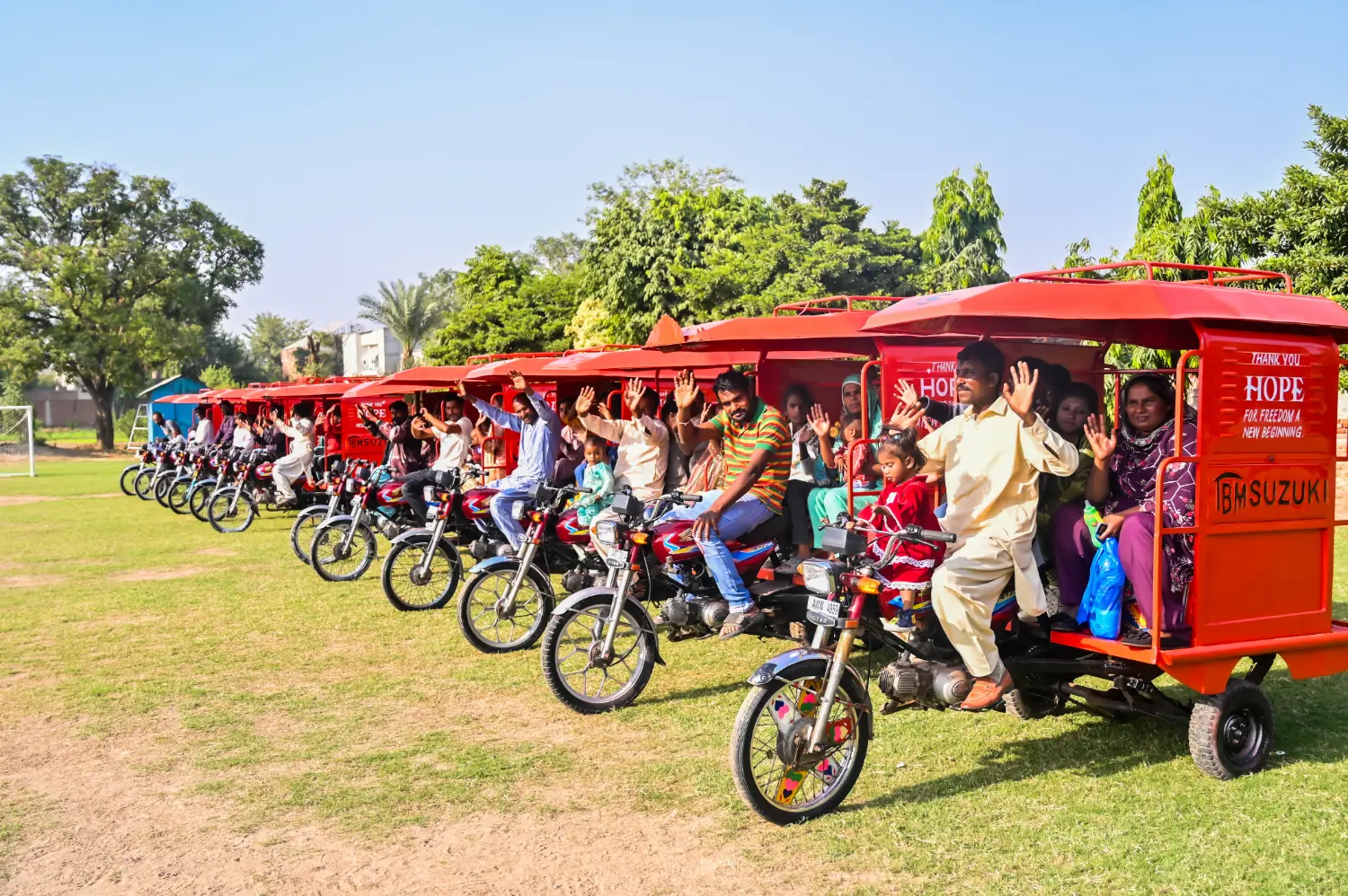 Twelve rickshaws provided to freed families as a business