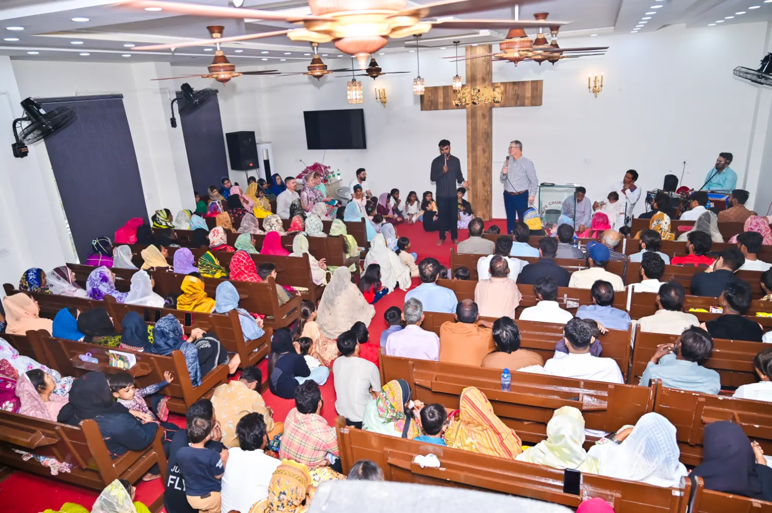 Founder of H.O.P.E. preaching at New Hope Church, Faisalabad