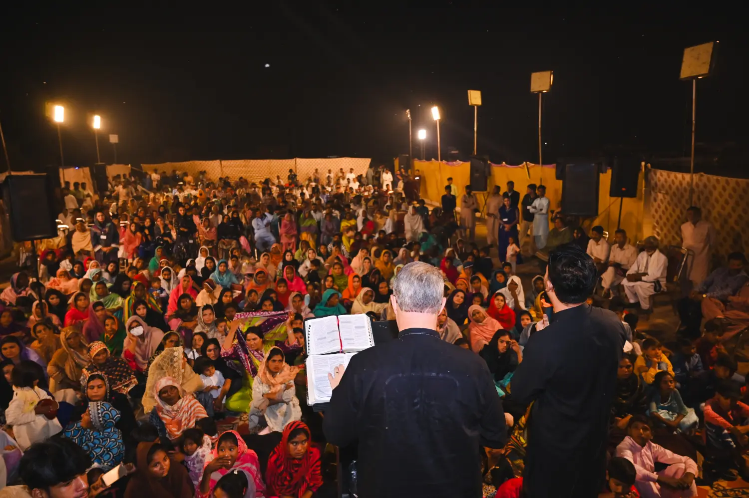 Pastor Ashkar Javed and Pastor Mark preaching at a crusade festival