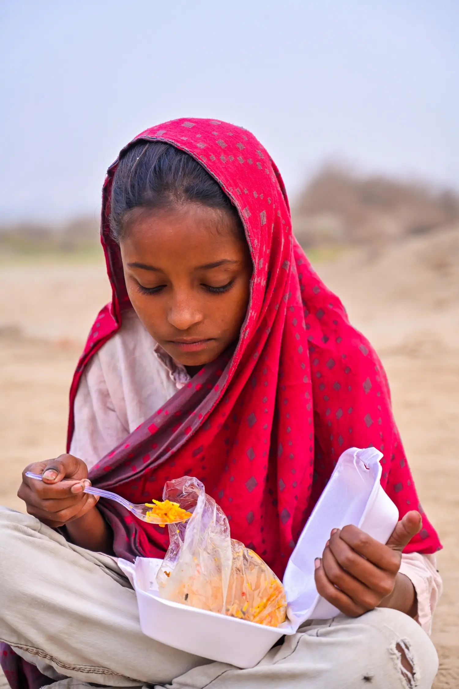 A Little Girl Eats