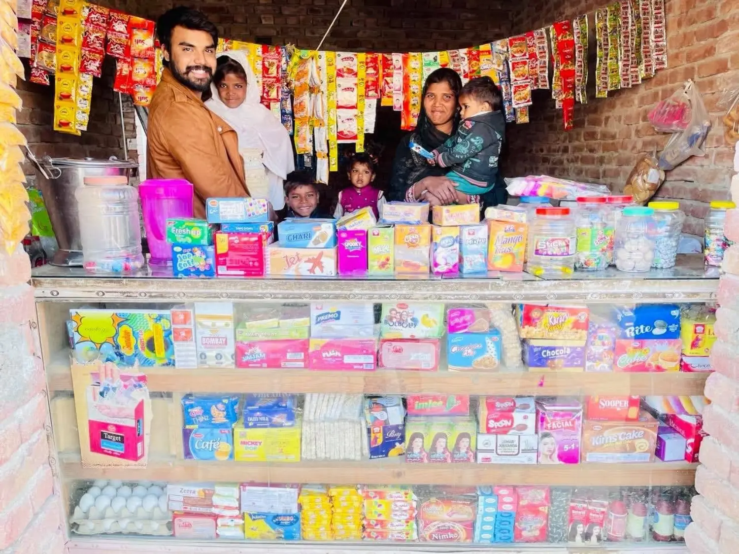 Pastor Suryani Javed providing a grocery shop to a freed family