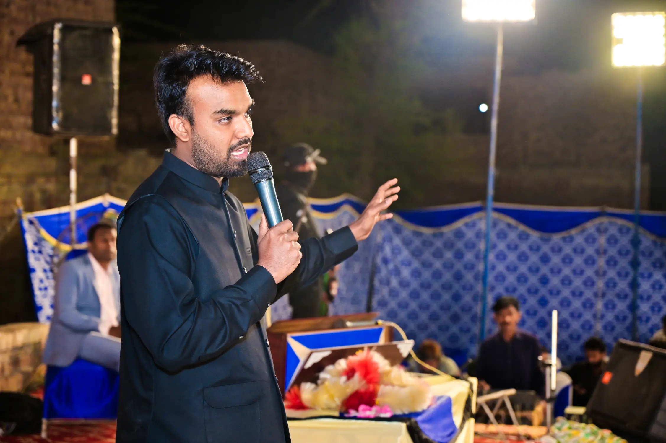 Pastor Suryani Javed preaching at a crusade