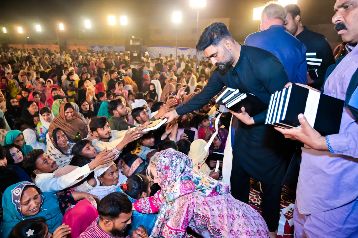 Bible distribution — replace with your photo