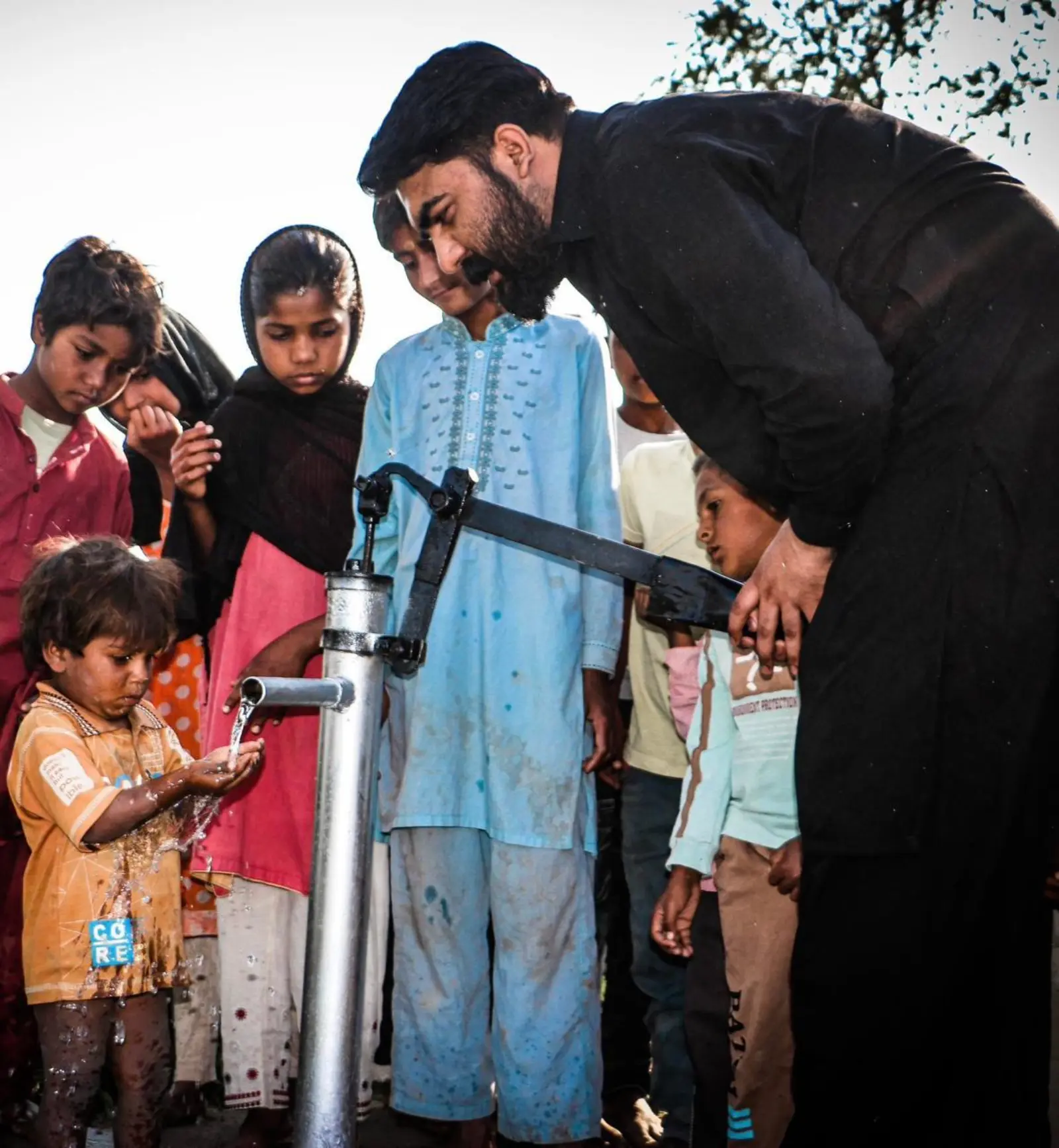 Pastor Ashkar Pumps the Water