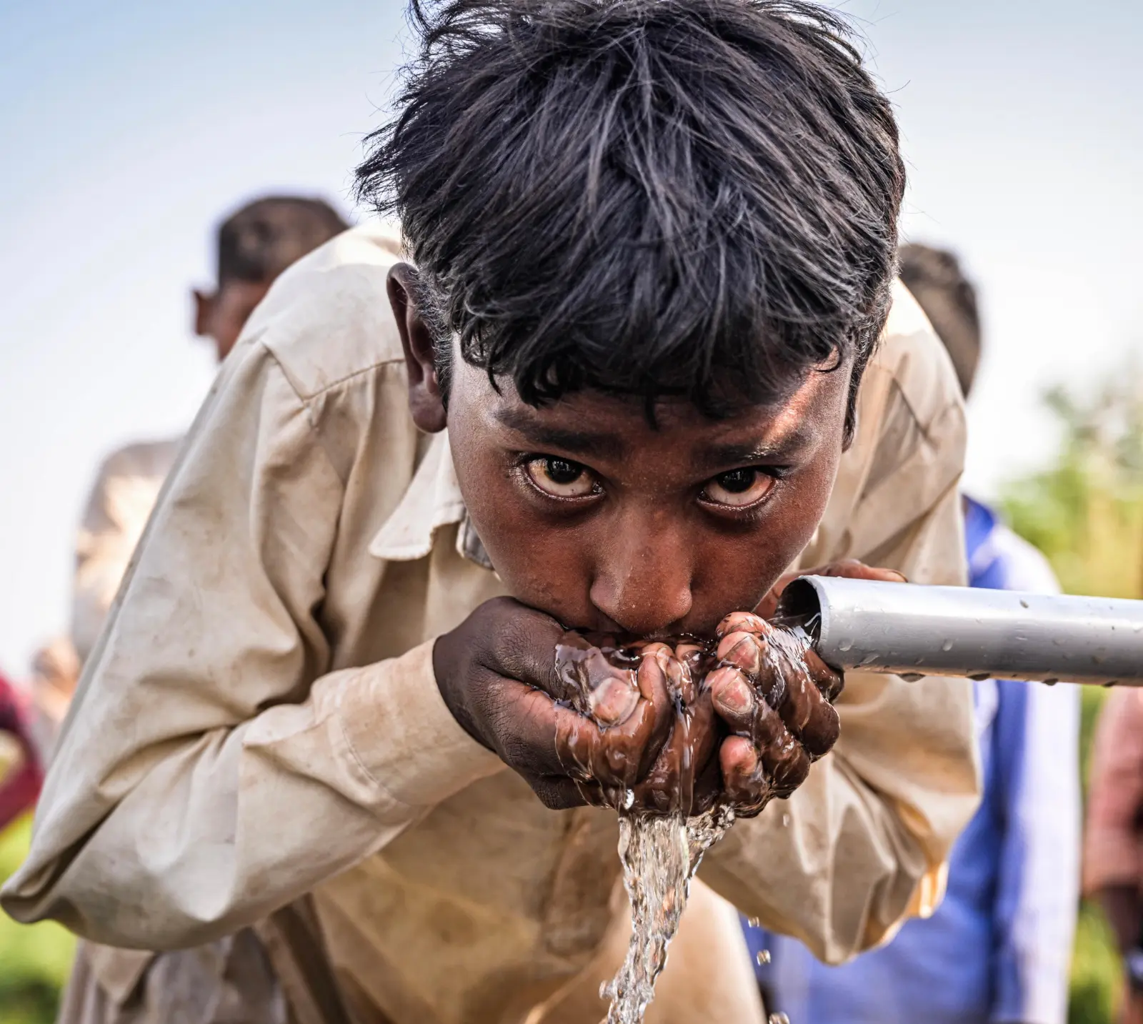 A Boy Drinks Clean Water