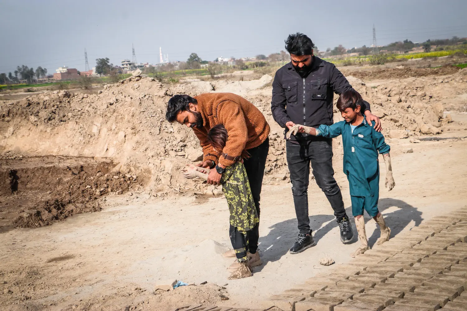 Two children being rescued
